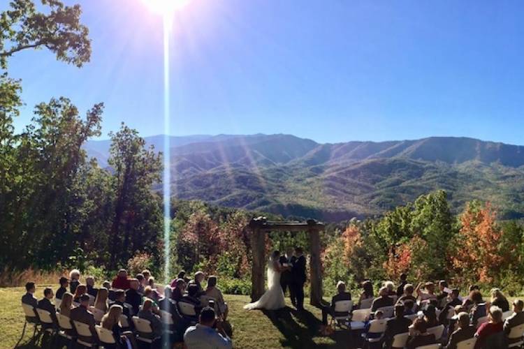 Couple getting married outside.