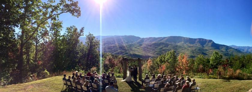 Couple getting married outside.